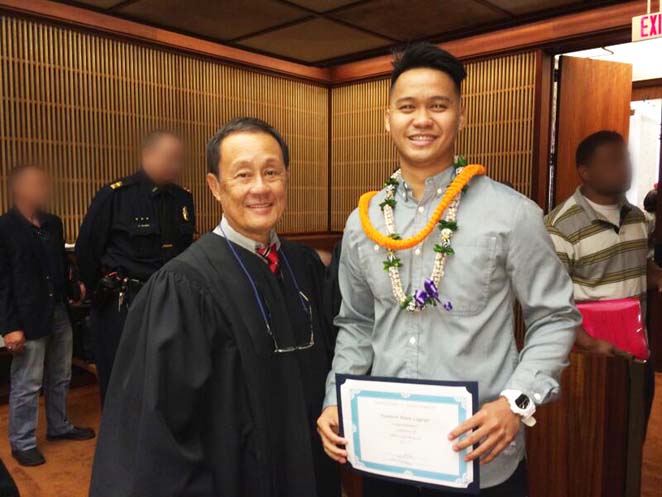 Kenneth Legaspi is pictured above (right) with presiding District Court Judge David Lo (left).  